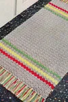 The Gray Rug With Stripes